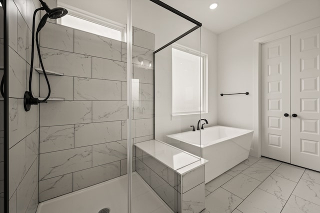 4413 Sandstrom Way, Fort Worth, TX 76179 - full bath with a freestanding bath, marble look tiles, a stall shower, and recessed lighting