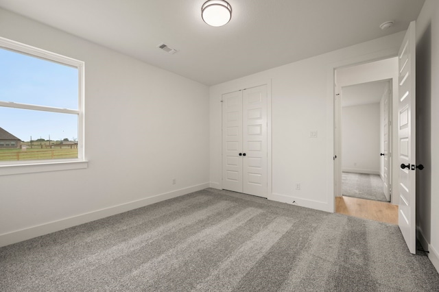 4413 Sandstrom Way, Fort Worth, TX 76179 - unfurnished bedroom featuring carpet floors, baseboards, and a closet