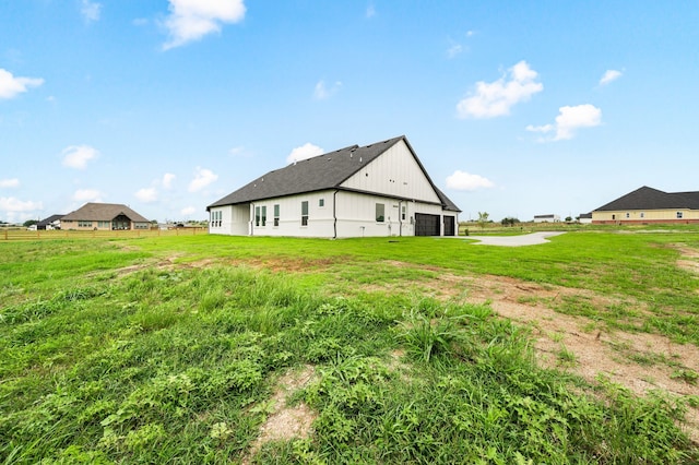 4413 Sandstrom Way, Fort Worth, TX 76179 - rear view of house with a garage and a lawn