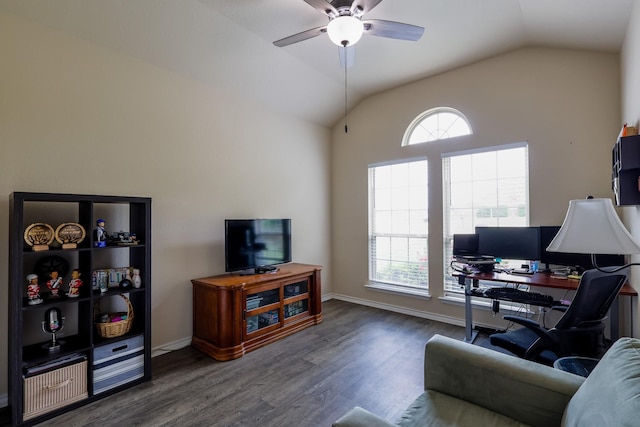 living area featuring ceiling fan, an office area, lofted ceiling, wood finished floors, and baseboards