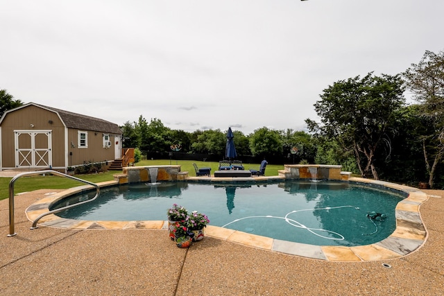 swimming pool featuring a yard, an outdoor structure, and a storage unit