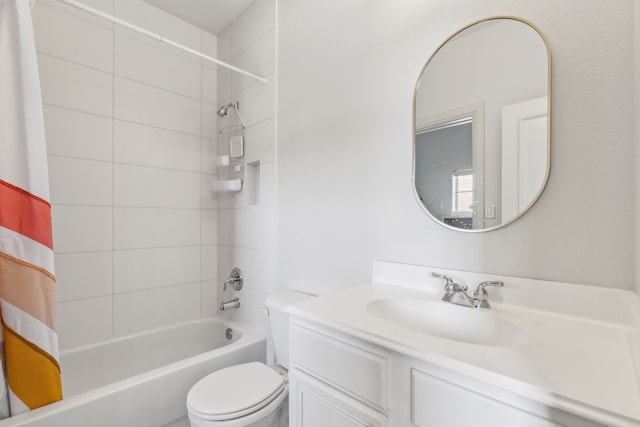 2576 Fountain Cv, Carrollton, TX 75006 - full bathroom featuring shower / tub combo, vanity, and toilet