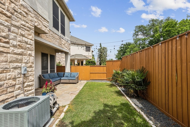 2576 Fountain Cv, Carrollton, TX 75006 - view of yard featuring central AC, a patio, a gate, and outdoor lounge area