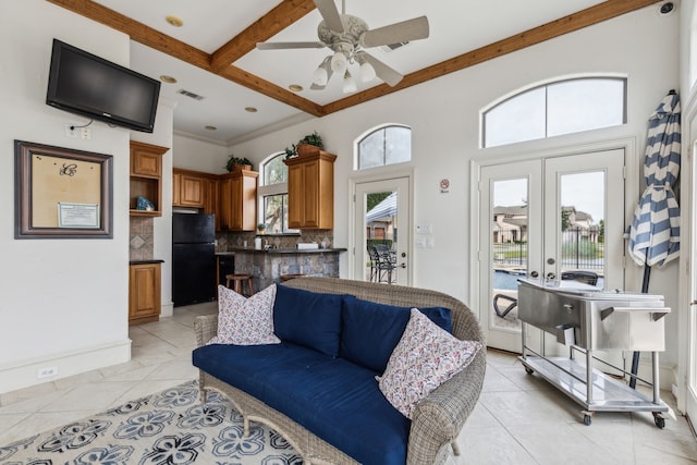 2576 Fountain Cv, Carrollton, TX 75006 - living area with ceiling fan, beamed ceiling, coffered ceiling, french doors, and baseboards