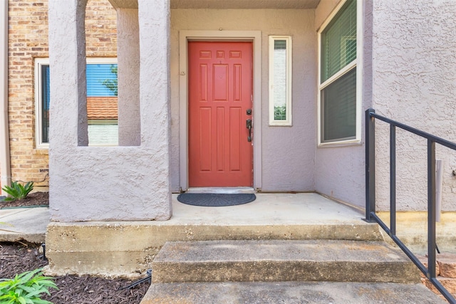 4242 N Capistrano Dr Unit 161, Dallas, TX 75287 - doorway to property featuring stucco siding