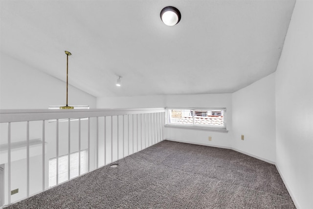 4242 N Capistrano Dr Unit 161, Dallas, TX 75287 - spare room featuring carpet floors, lofted ceiling, and a ceiling fan