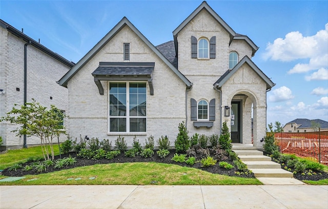 2840 Chester Dr, Celina, TX 75009 - french provincial home with brick siding and roof with shingles