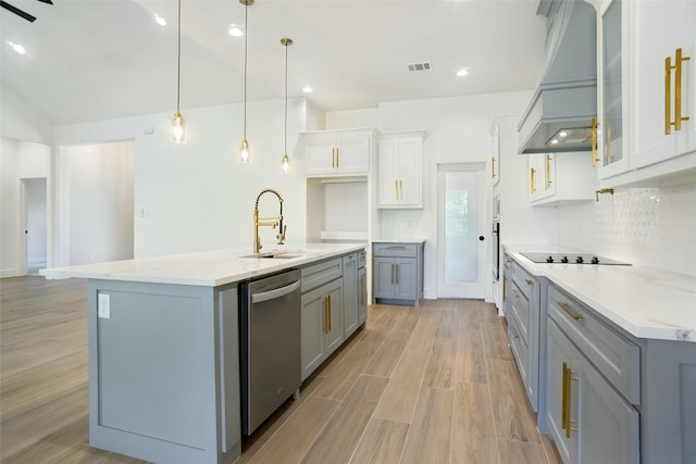 316 Falcon Ct, Springtown, TX 76082 - kitchen with stainless steel dishwasher, premium range hood, a sink, gray cabinetry, and recessed lighting