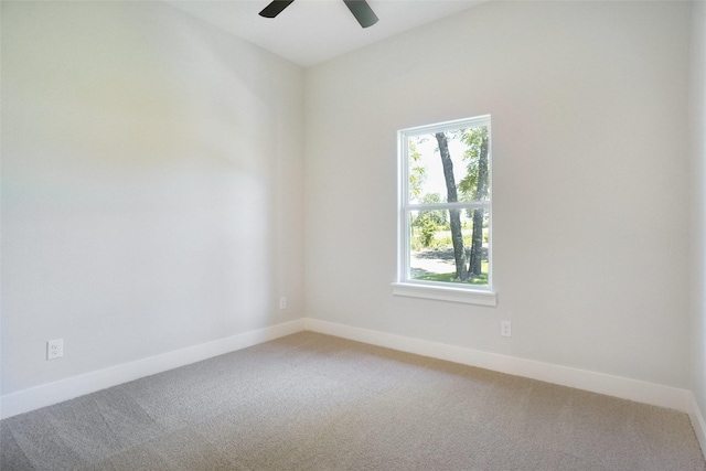 316 Falcon Ct, Springtown, TX 76082 - empty room with light colored carpet, a ceiling fan, and baseboards