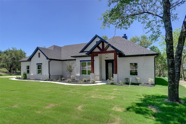 316 Falcon Ct, Springtown, TX 76082 - view of front of house with brick siding, a front yard, and a shingled roof