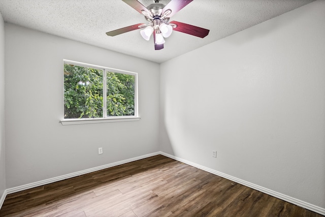 2118 W E Roberts Dr, Grand Prairie, TX 75051 - empty room with wood finished floors, baseboards, and a ceiling fan