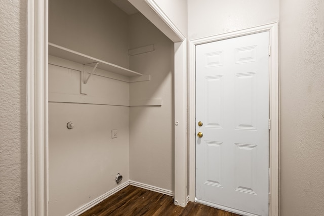 2118 W E Roberts Dr, Grand Prairie, TX 75051 - washroom featuring dark wood-type flooring and baseboards