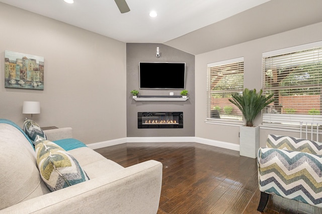 12604 Ocean Spray Dr, Frisco, TX 75036 - living area with baseboards, hardwood / wood-style flooring, recessed lighting, a ceiling fan, and a glass covered fireplace