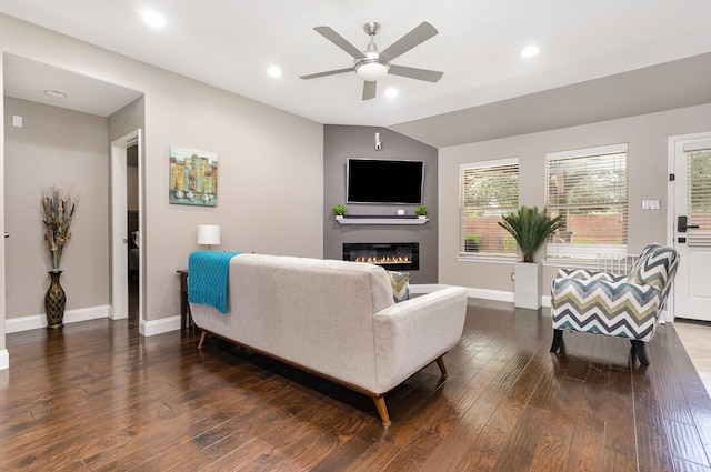 12604 Ocean Spray Dr, Frisco, TX 75036 - living area featuring ceiling fan, a glass covered fireplace, wood finished floors, baseboards, and recessed lighting