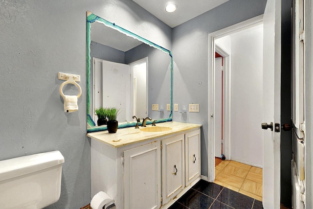 3714 Burning Tree Ln, Garland, TX 75042 - half bath featuring toilet and vanity