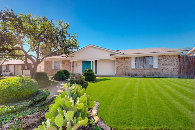 3714 Burning Tree Ln, Garland, TX 75042 - single story home with brick siding