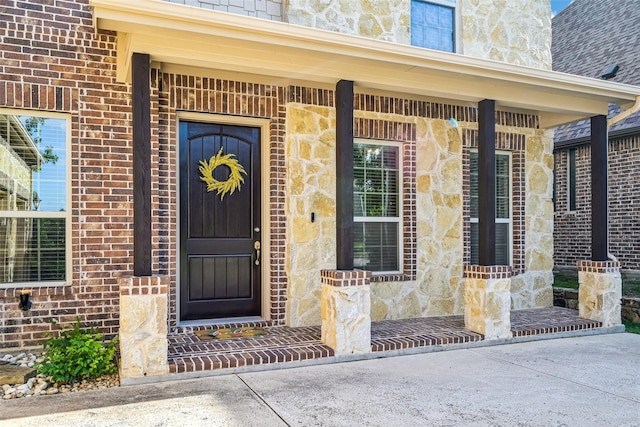 view of exterior entry with stone siding