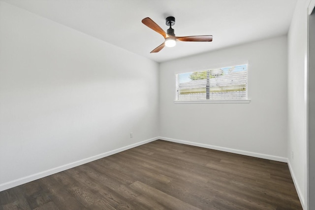 4512 Starlight Dr, Haltom City, TX 76117 - unfurnished room featuring dark wood-style floors, baseboards, and a ceiling fan