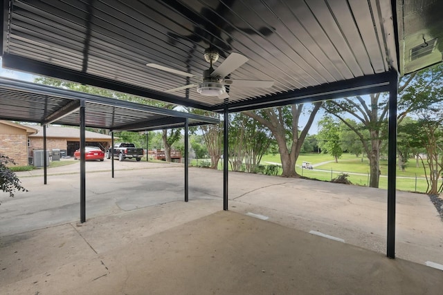 4512 Starlight Dr, Haltom City, TX 76117 - view of parking with ceiling fan and a carport