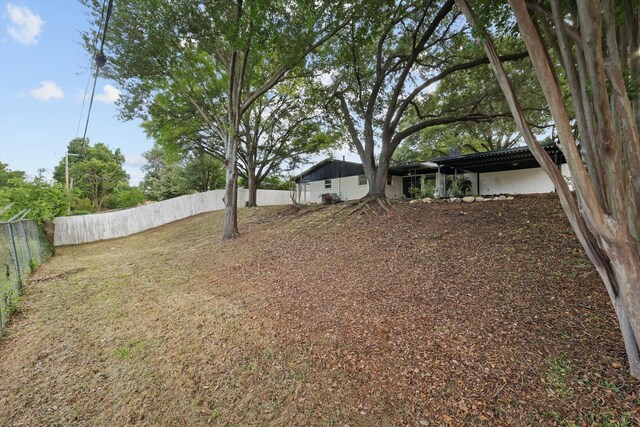 4512 Starlight Dr, Haltom City, TX 76117 - view of yard with fence