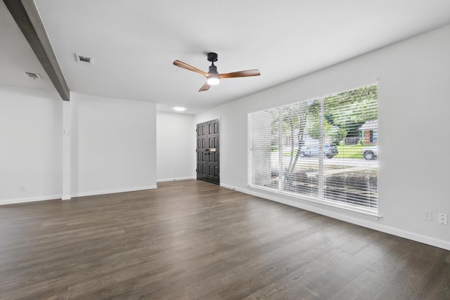4512 Starlight Dr, Haltom City, TX 76117 - unfurnished living room featuring a ceiling fan, baseboards, and dark wood-style floors