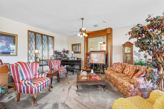 3705 Northcrest Dr, Cleburne, TX 76031 - carpeted living room with a ceiling fan and a textured ceiling