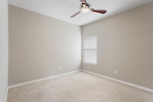 2701 Royal Troon Dr, Plano, TX 75025 - spare room featuring light carpet, a ceiling fan, and baseboards