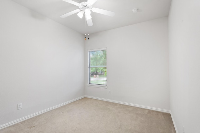 2701 Royal Troon Dr, Plano, TX 75025 - spare room with light colored carpet, baseboards, and ceiling fan