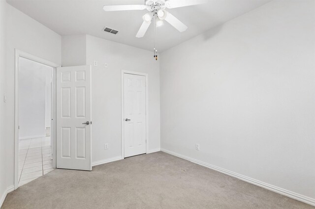 2701 Royal Troon Dr, Plano, TX 75025 - unfurnished bedroom with carpet flooring, baseboards, and a ceiling fan