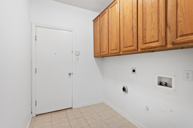 2701 Royal Troon Dr, Plano, TX 75025 - laundry area with gas dryer hookup, electric dryer hookup, cabinet space, hookup for a washing machine, and baseboards