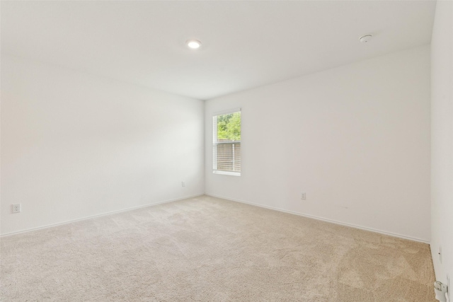 7709 Lindheimer Ln, Mckinney, TX 75071 - unfurnished room featuring light colored carpet and baseboards