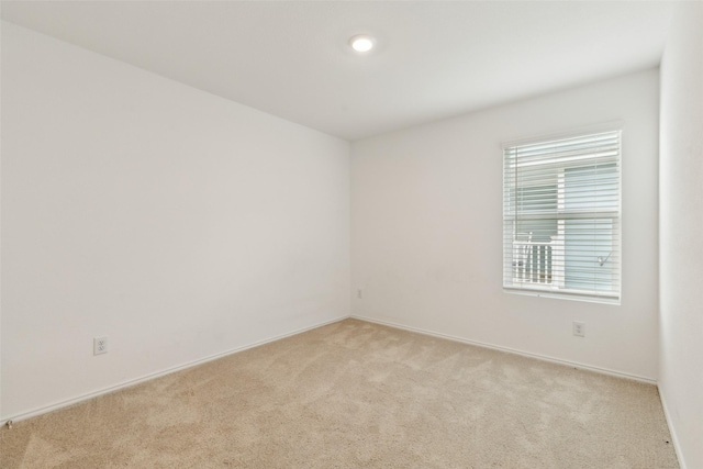 7709 Lindheimer Ln, Mckinney, TX 75071 - unfurnished room with light colored carpet and baseboards