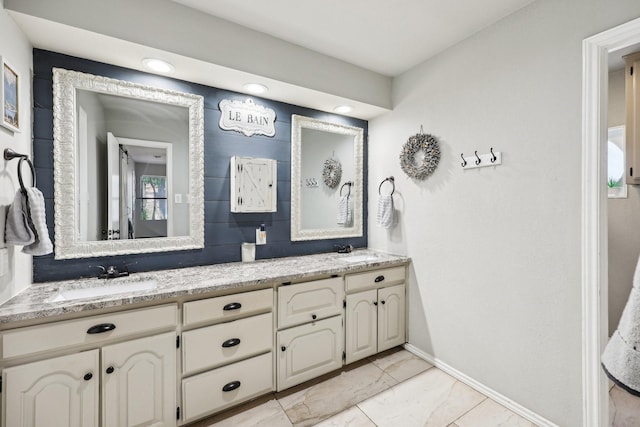 3206 S Fm 51, Decatur, TX 76234 - bathroom with double vanity and baseboards