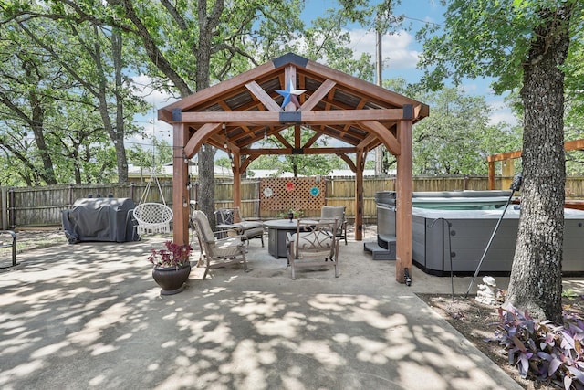 3206 S Fm 51, Decatur, TX 76234 - view of patio / terrace featuring a gazebo, a hot tub, area for grilling, and a fenced backyard
