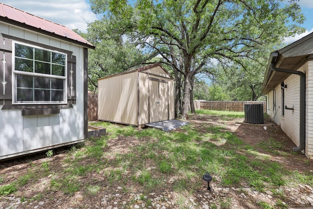 3206 S Fm 51, Decatur, TX 76234 - view of yard featuring a storage shed, cooling unit, fence, and an outdoor structure