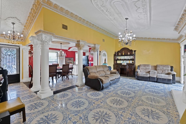 10227 Oak Gate Ln, Dallas, TX 75217 - tiled living area featuring a chandelier, ornate columns, baseboards, and crown molding