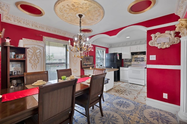10227 Oak Gate Ln, Dallas, TX 75217 - dining area featuring a chandelier and arched walkways