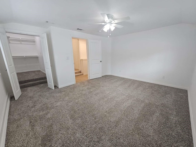 211 Hickory Ln, Weatherford, TX 76086 - unfurnished bedroom with carpet, baseboards, vaulted ceiling, a ceiling fan, and a closet