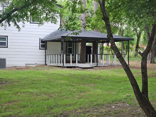 211 Hickory Ln, Weatherford, TX 76086 - back of house with a yard and central air condition unit