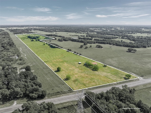 1412 US Highway 84, Teague, TX 75860 - aerial view of sparsely populated area with property boundaries highlighted