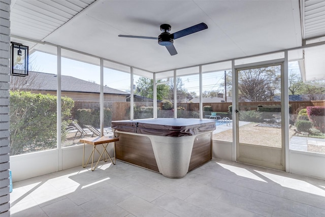 7728 La Bolsa, Dallas, TX 75248 - sunroom with a jacuzzi, ceiling fan, and healthy amount of natural light