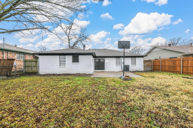 1846 Oak Hill Cir, Dallas, TX 75217 - back of property featuring a patio area, brick siding, and central AC