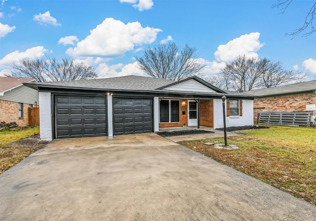 1846 Oak Hill Cir, Dallas, TX 75217 - ranch-style home featuring a garage, concrete driveway, brick siding, and covered porch