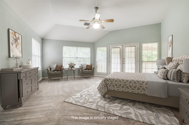 bedroom with access to exterior, lofted ceiling, light colored carpet, ceiling fan, and french doors