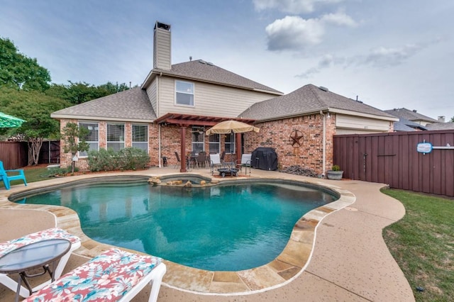 10557 Stargazer Dr, Frisco, TX 75033 - view of swimming pool featuring a fenced backyard, a patio area, a pool with connected hot tub, and grilling area