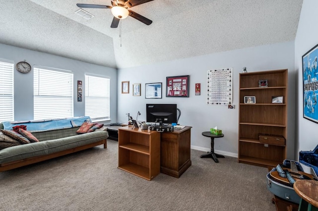 office area with carpet flooring, ceiling fan, a textured ceiling, lofted ceiling, and baseboards