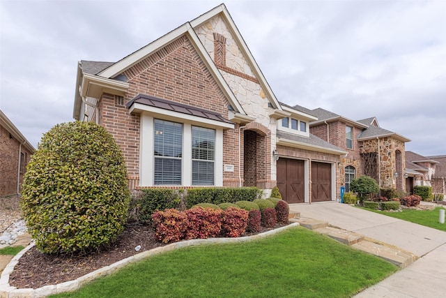 409 Rosemont Ln, Fairview, TX 75069 - view of front of property featuring brick siding, an attached garage, driveway, a front yard, and roof with shingles