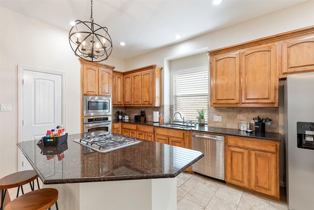 409 Rosemont Ln, Fairview, TX 75069 - kitchen with appliances with stainless steel finishes, a sink, decorative backsplash, a kitchen breakfast bar, and light tile patterned floors