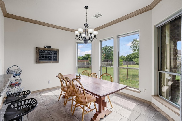 dining area featuring crown molding, a chandelier, baseboards, and light tile patterned floors