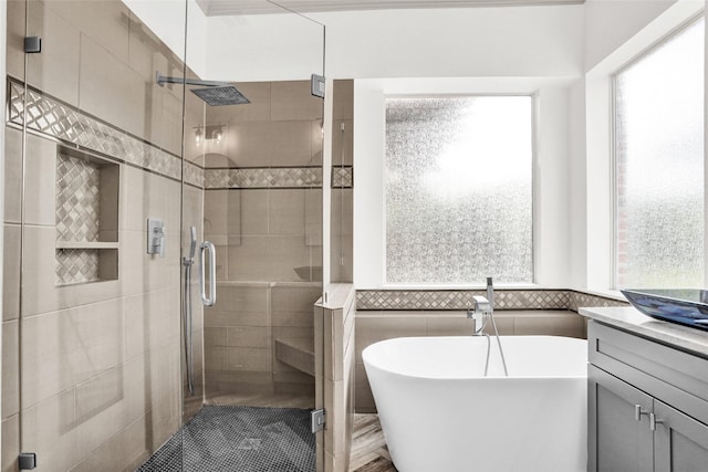 5250 Pueblo Ln, Frisco, TX 75034 - full bath featuring a freestanding bath, a shower stall, tile walls, and vanity